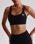 Black EVL sports bra with a scoop neckline and contrasting chest logo.