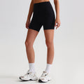 Black EVL high-rise cycling shorts with a fitted, thigh-length silhouette.