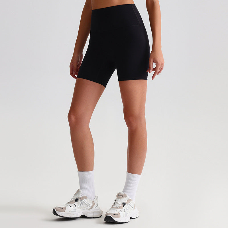 Black EVL high-rise cycling shorts with a fitted, thigh-length silhouette.