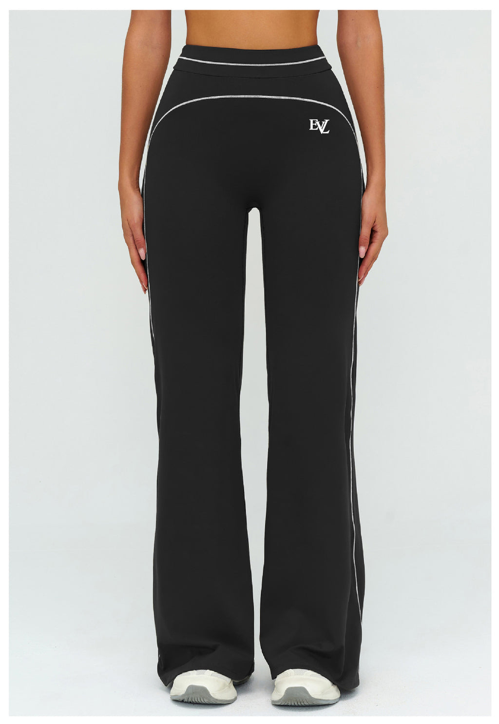 Black EVL leggings with a distinctive flared-leg silhouette.