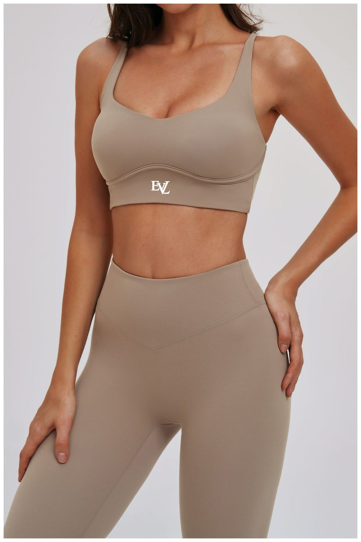 Light Coffee EVL sports bra with a scoop neckline and wide underband.