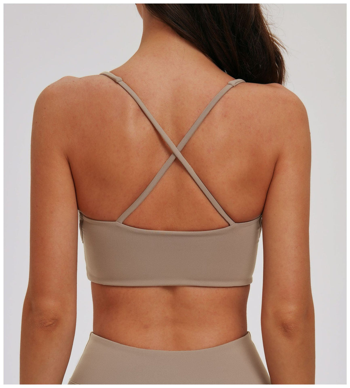 Light Coffee EVL cross-back sports bra with slim adjustable straps.